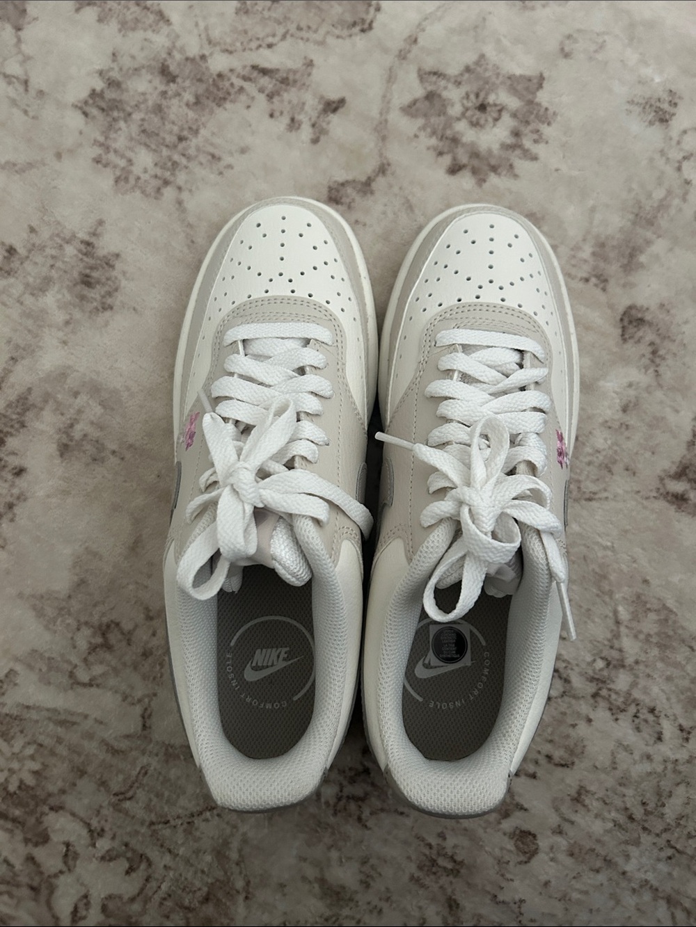 Nike Women’s White and Beige Low-Top Sneakers with Pink Logo